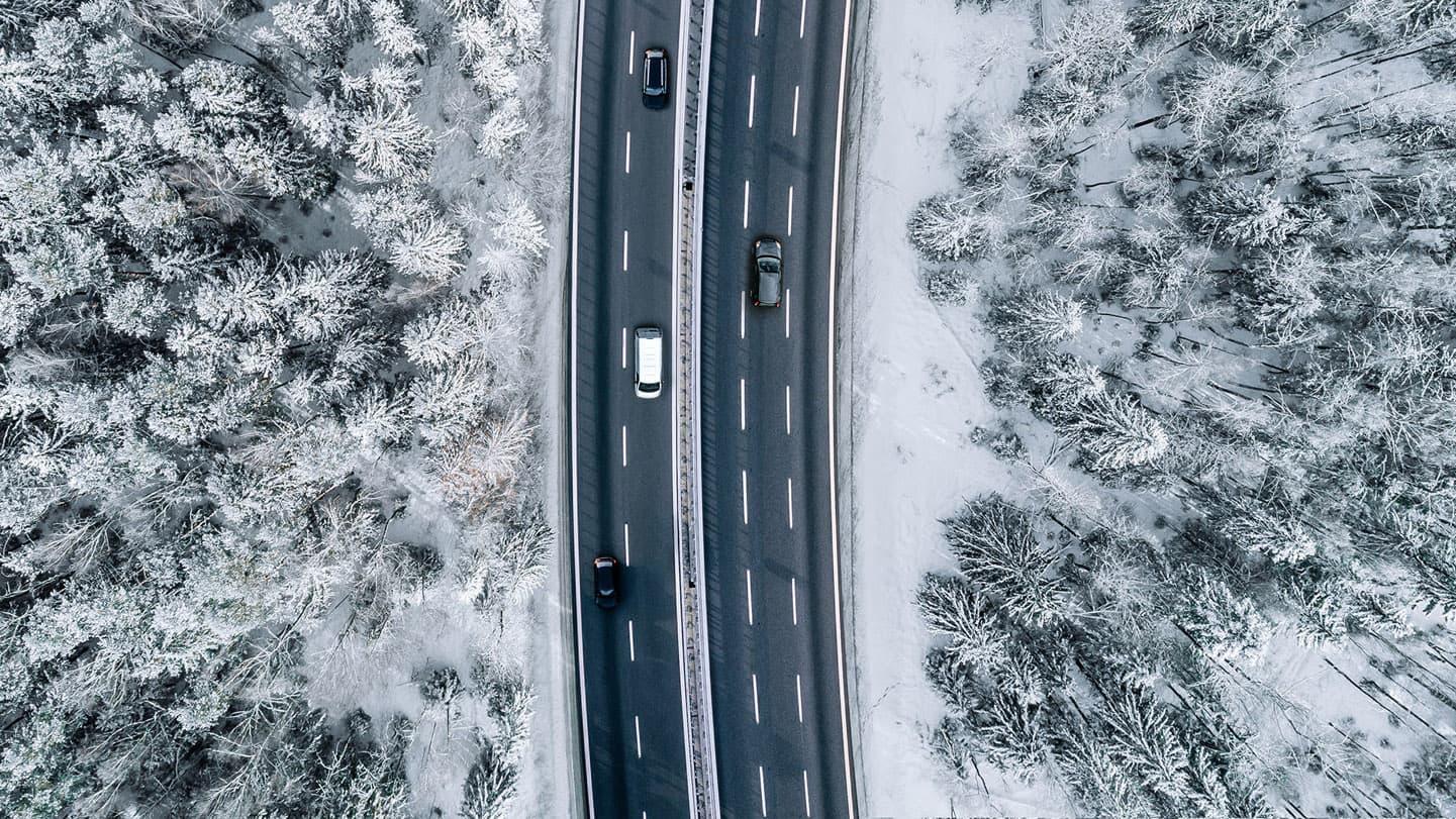 snowy-forest-aerial-highway snowy-forest-aerial-highway