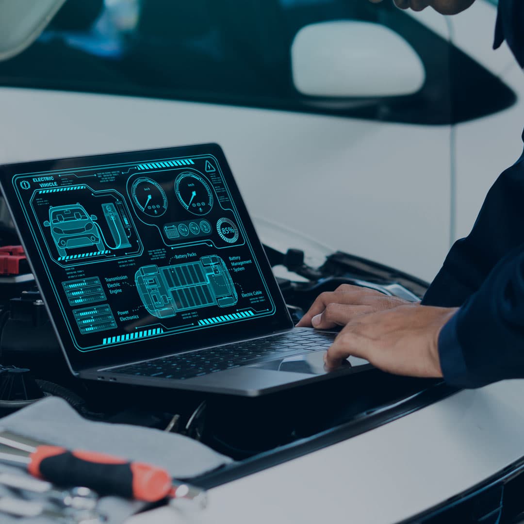 car-mechanic-using-laptop-computer-examining-tunin-2024-12-01-11-09-24-utc1-1 car-mechanic-using-laptop-computer-examining-tunin-2024-12-01-11-09-24-utc1-1