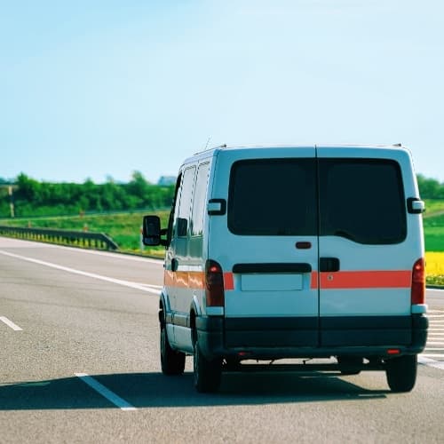 Fleet vehicle driving on a sunny spring day, symbolizing seasonal fleet maintenance and readiness. Fleet vehicle driving on a sunny spring day, symbolizing seasonal fleet maintenance and readiness.